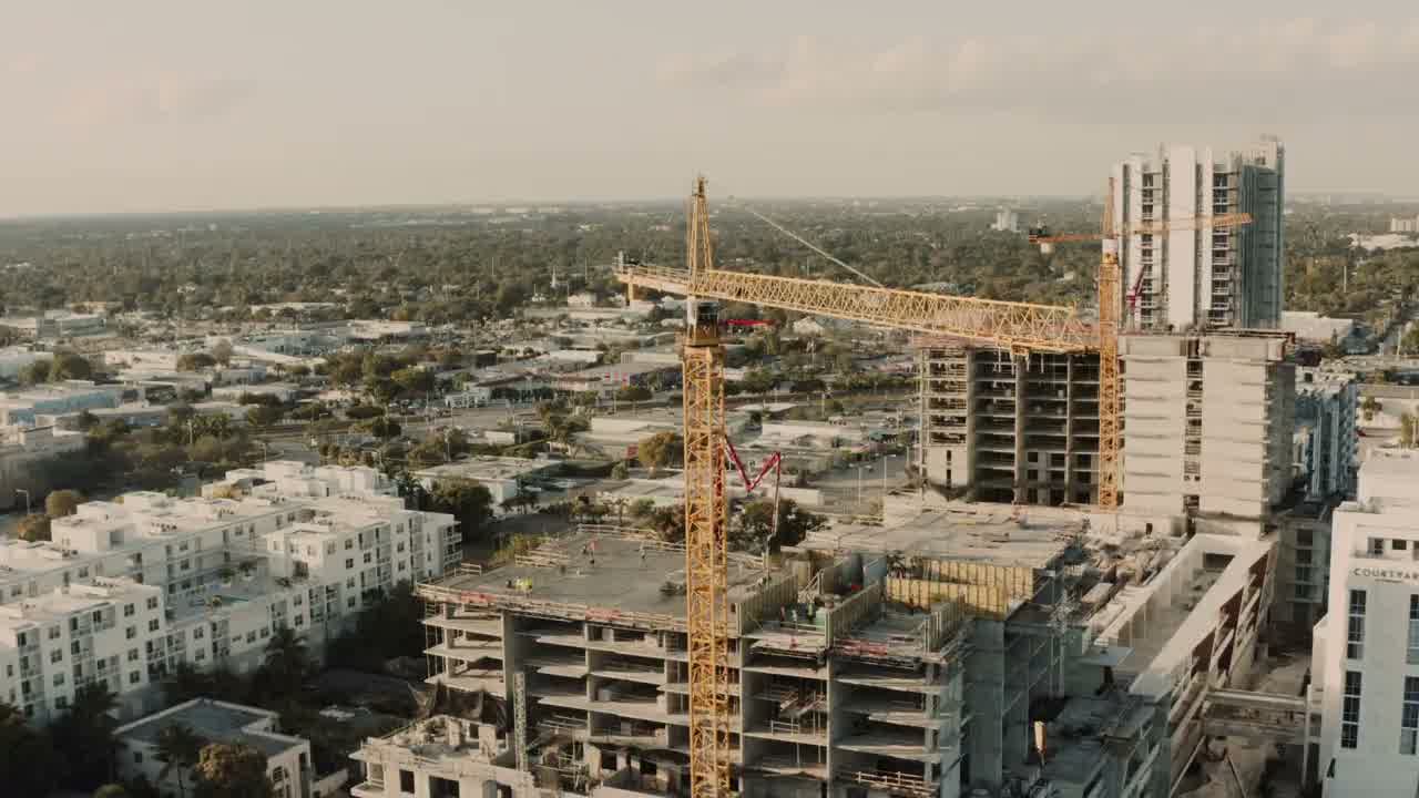 Aerial view of a construction site showing progress and layout.
